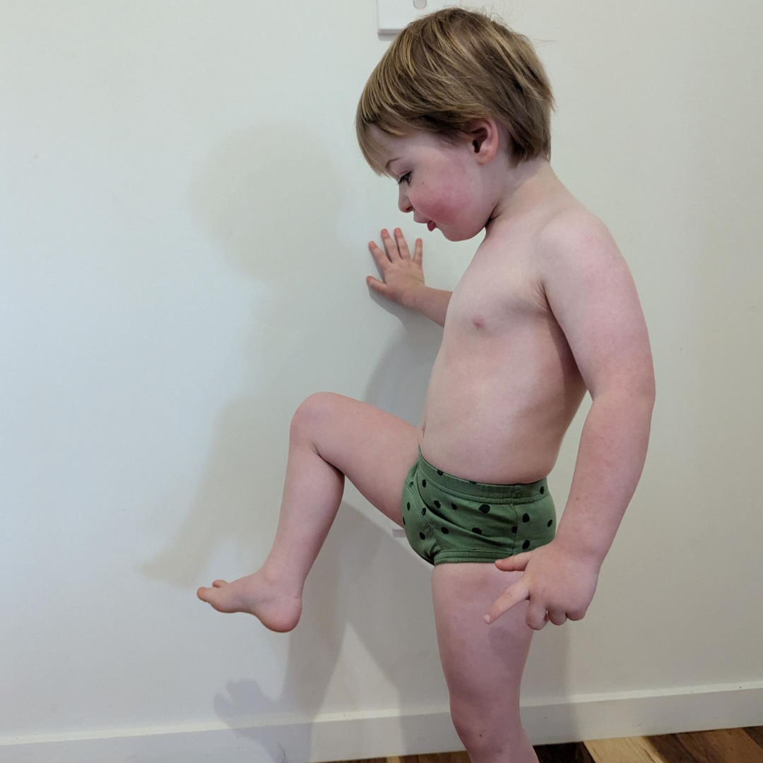 Child wearing Snazzi Pants Day Trainers - Sprouty Spots