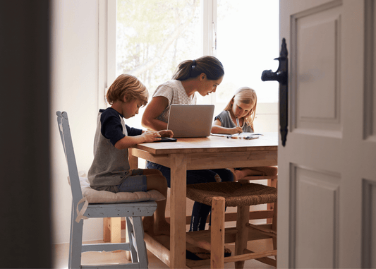 Mum working with her two children