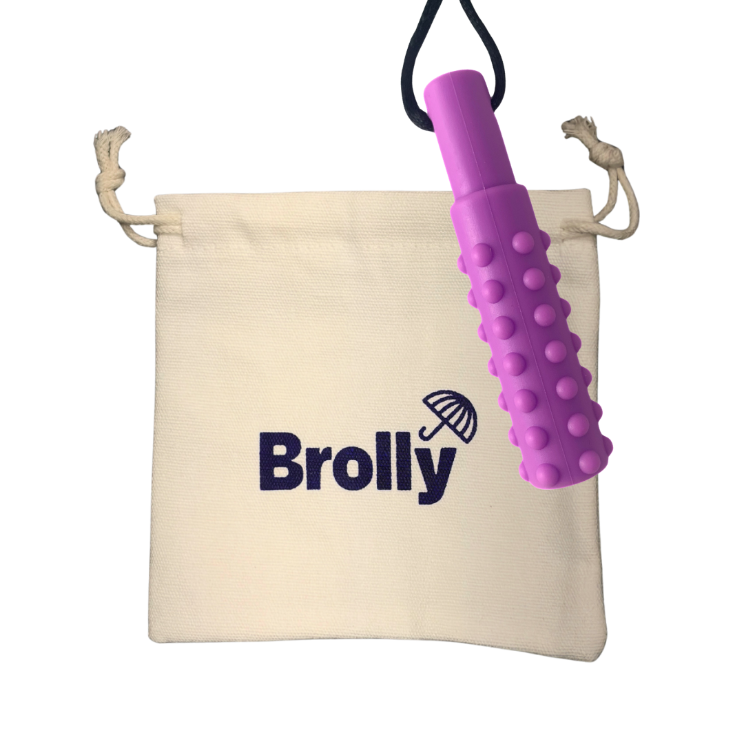 Beige drawstring pouch and mace-shaped Brolly Sheet Chew Necklace on a black cord against a white background - Purple
