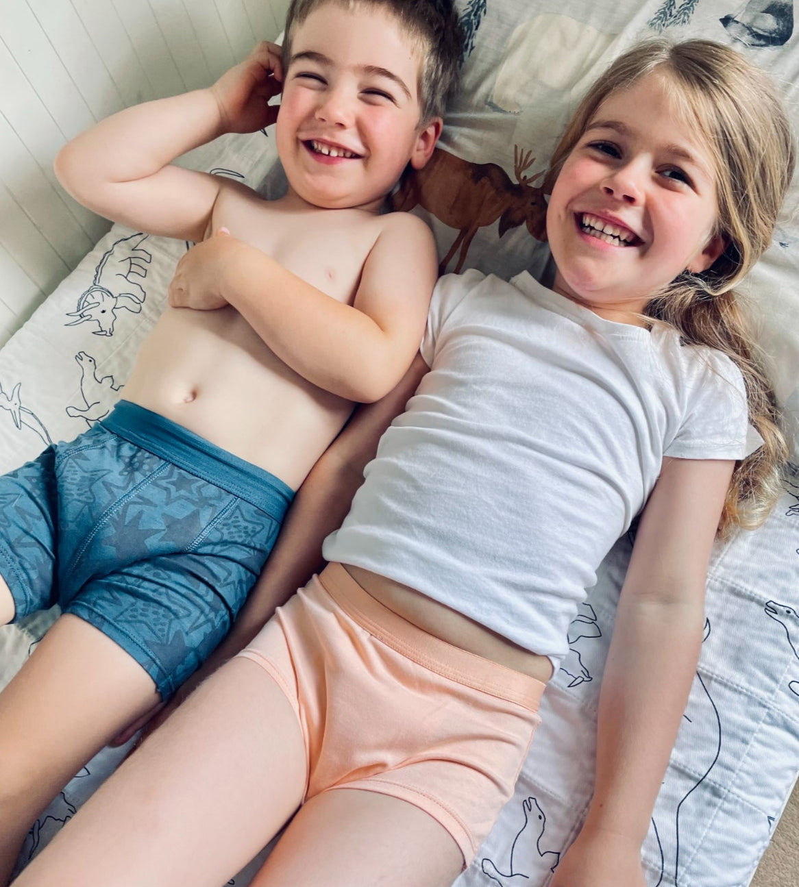 Children wearing Snazzi Pants Nights Trainers 
