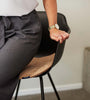 Women sitting on a chair pad