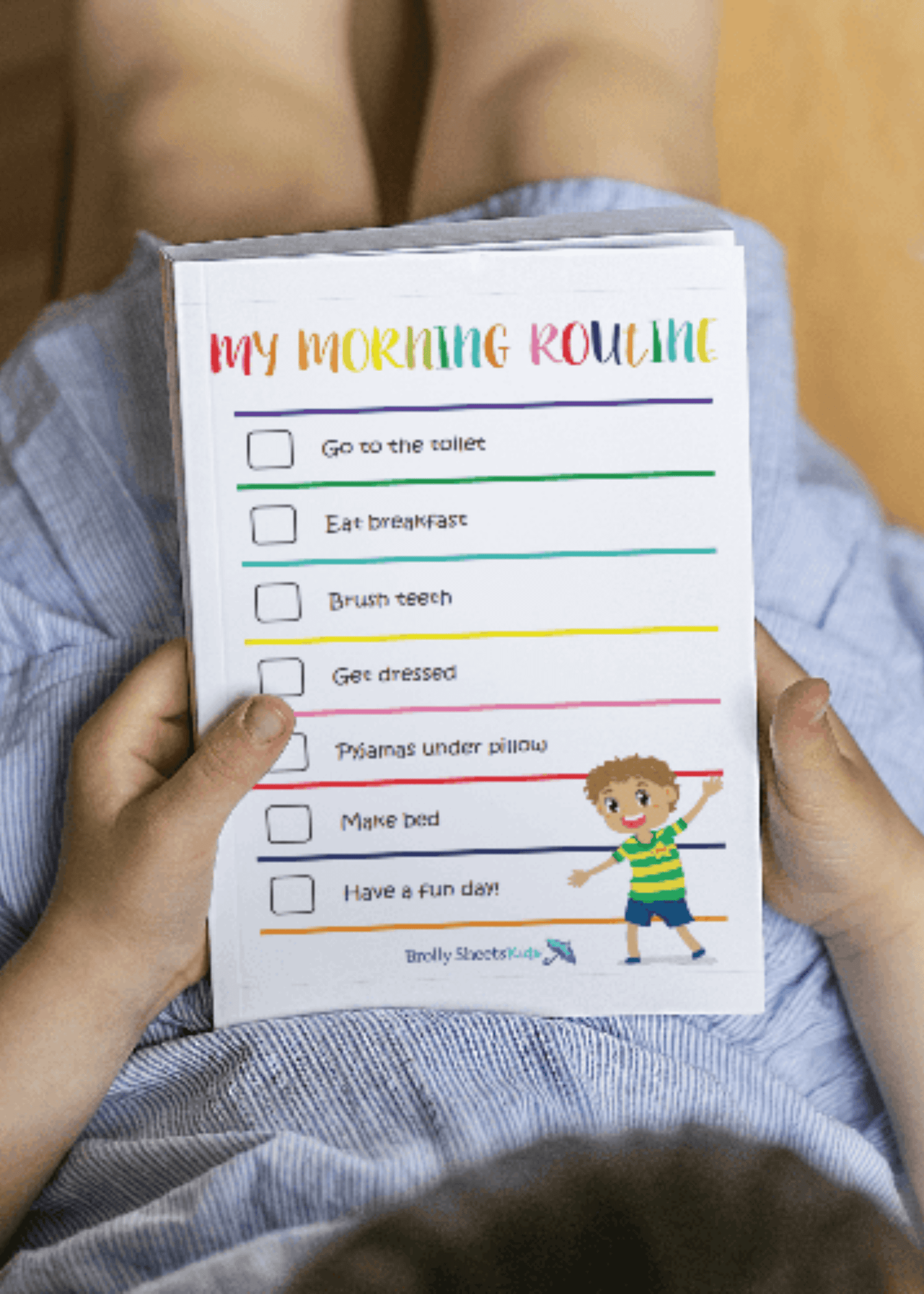 Routine chart being held by young child